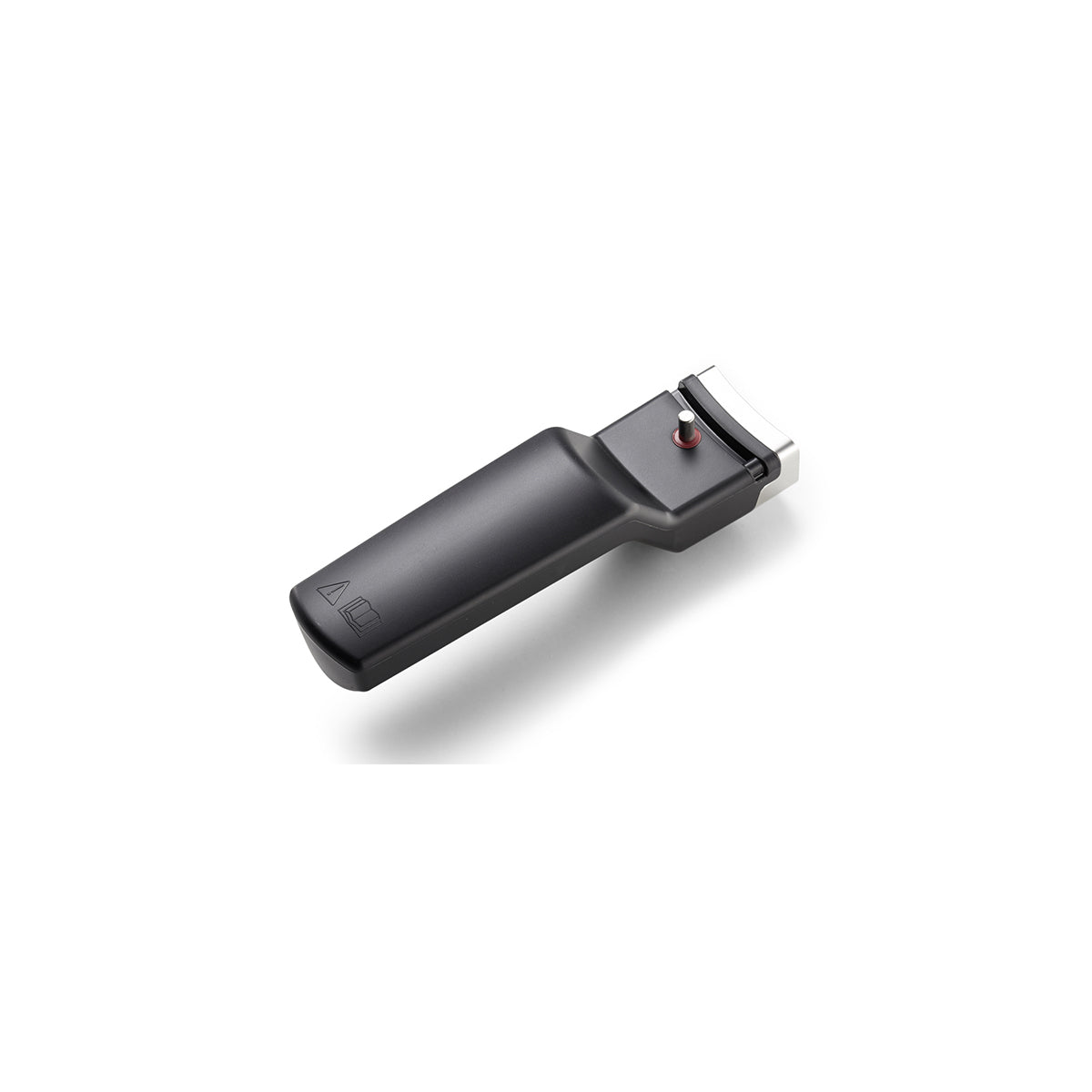 Eine schwarze Haarschneidemaschine neben der Fissler Vitavit® Topfstiel für Schnellbratpfanne 26 cm, die für deutsche Qualität und Präzision steht.